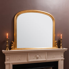 Amos Gold leaf arch over mantel mirror