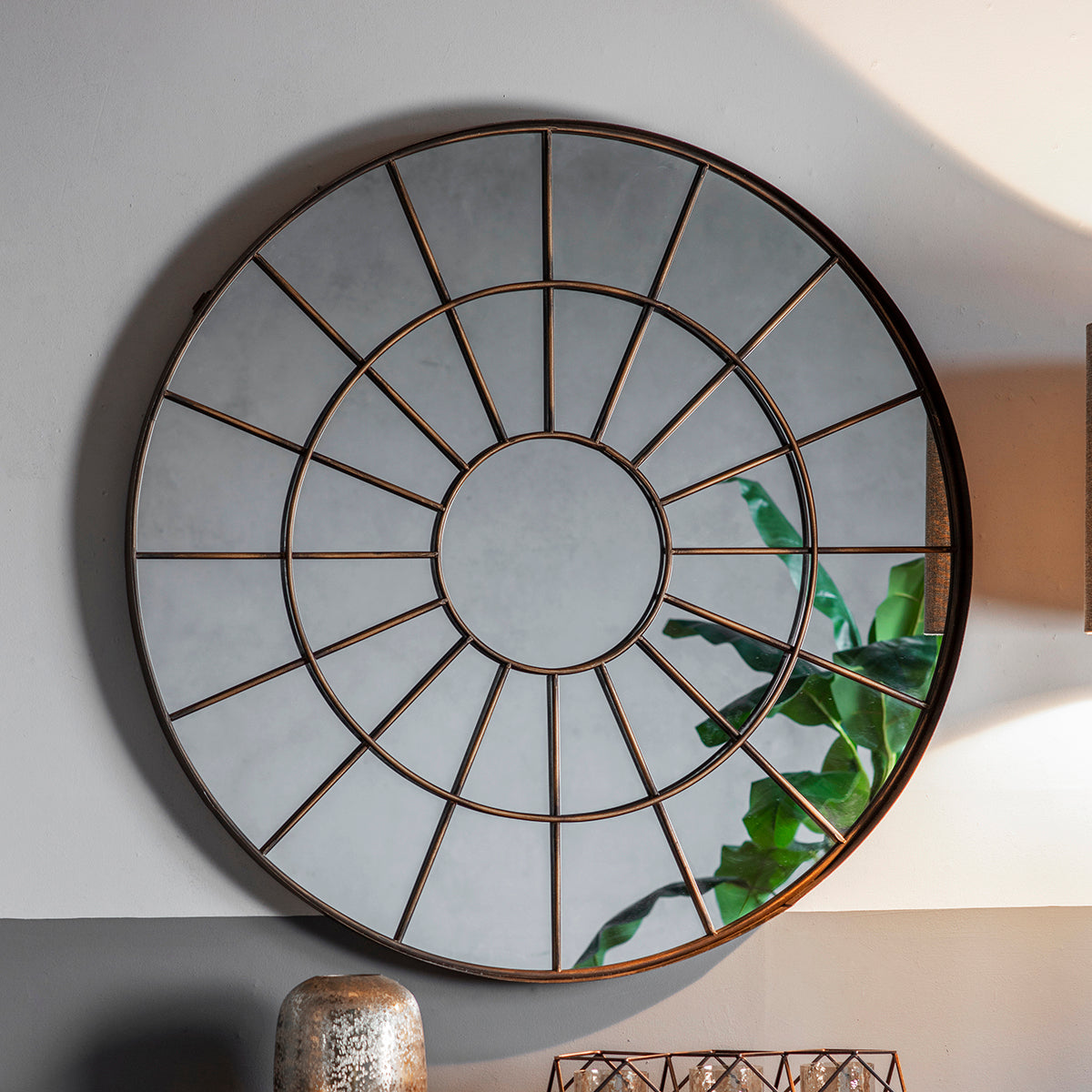 Amos Aged bronze round window mirror