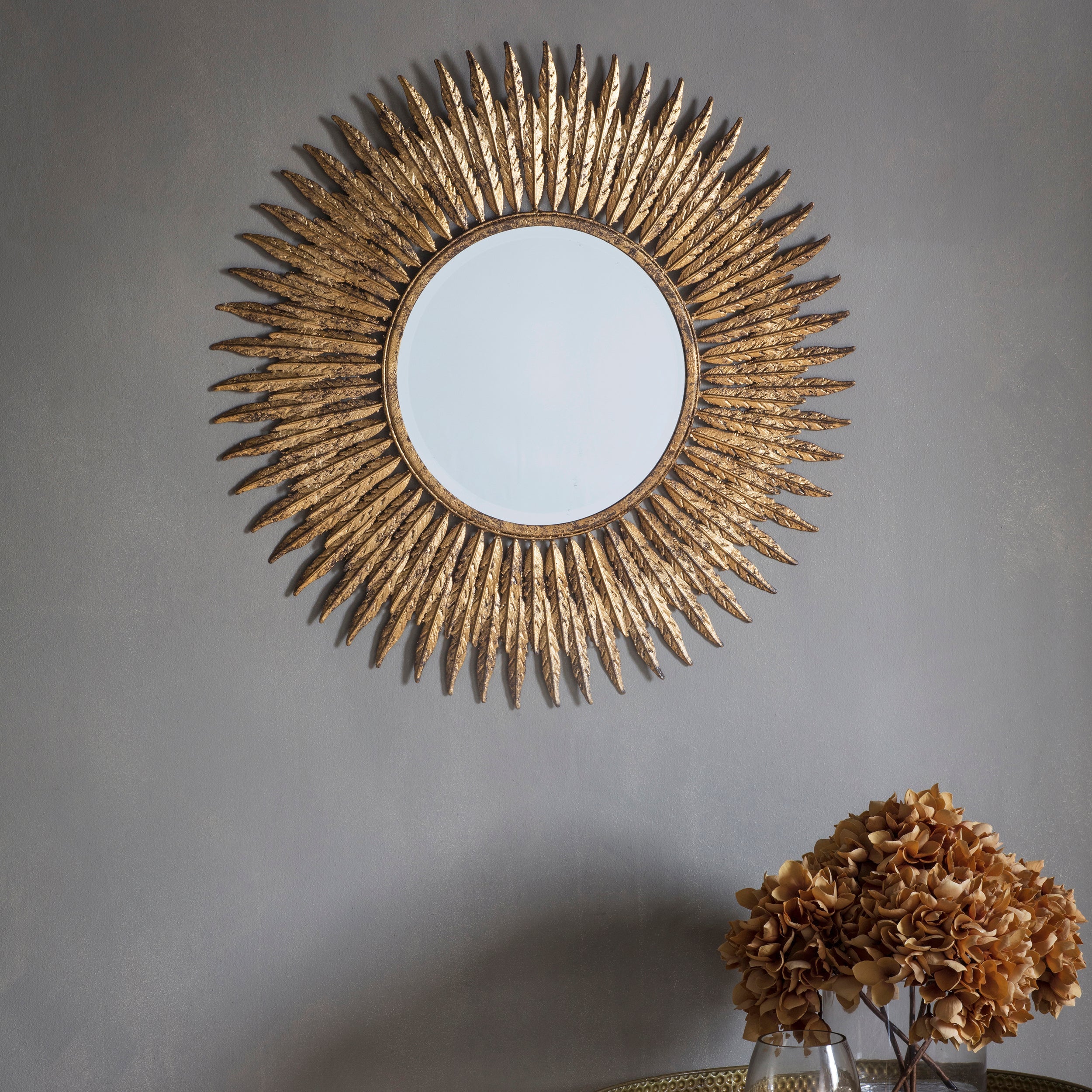 Amos Aged gold feathered frame round mirror