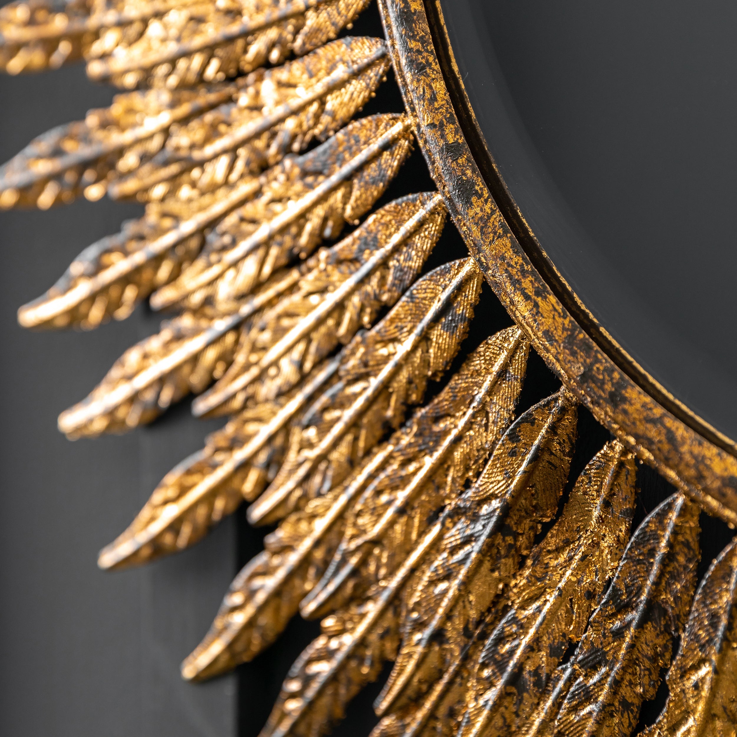 Amos Aged gold feathered frame round mirror