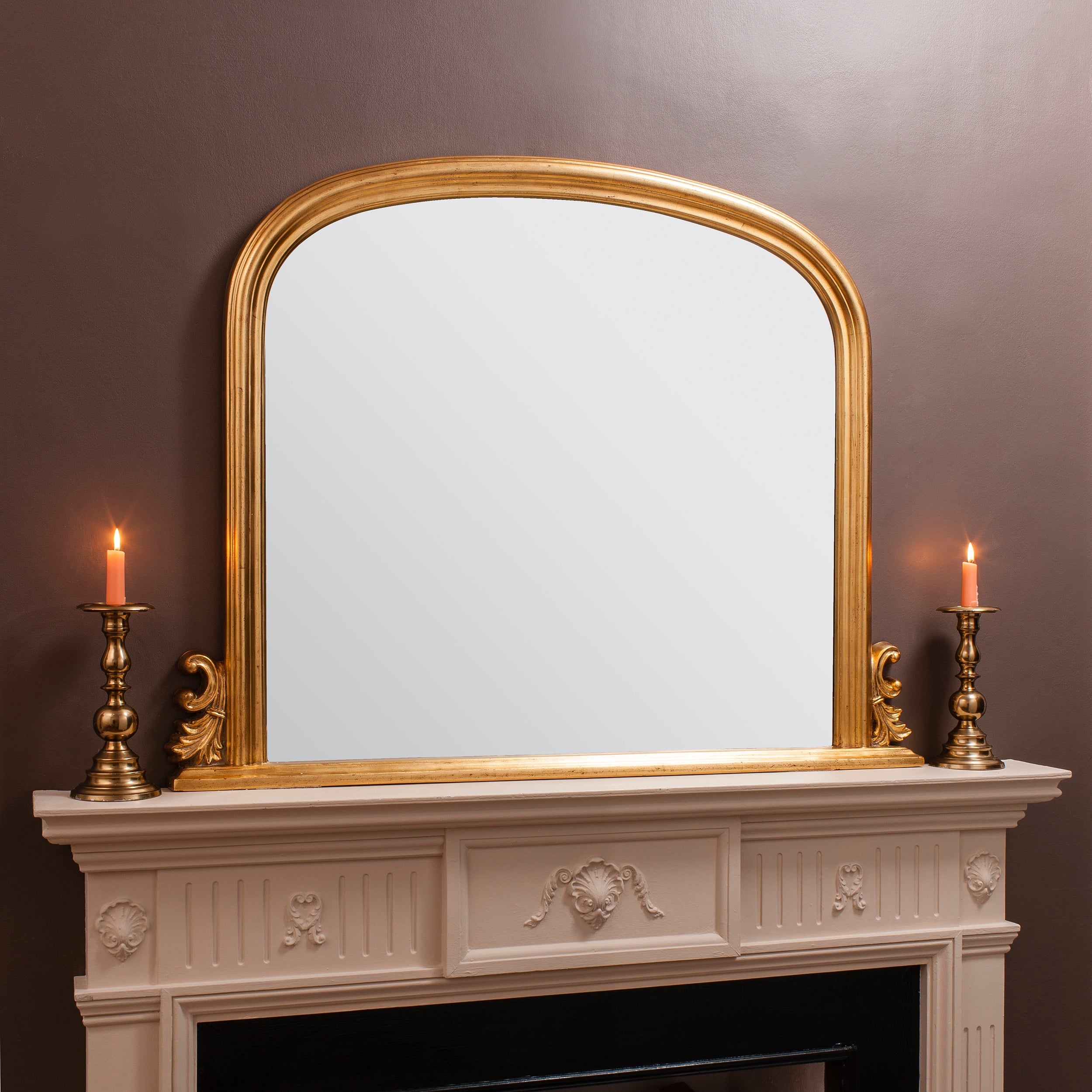 Amos Gold leaf arch over mantel mirror