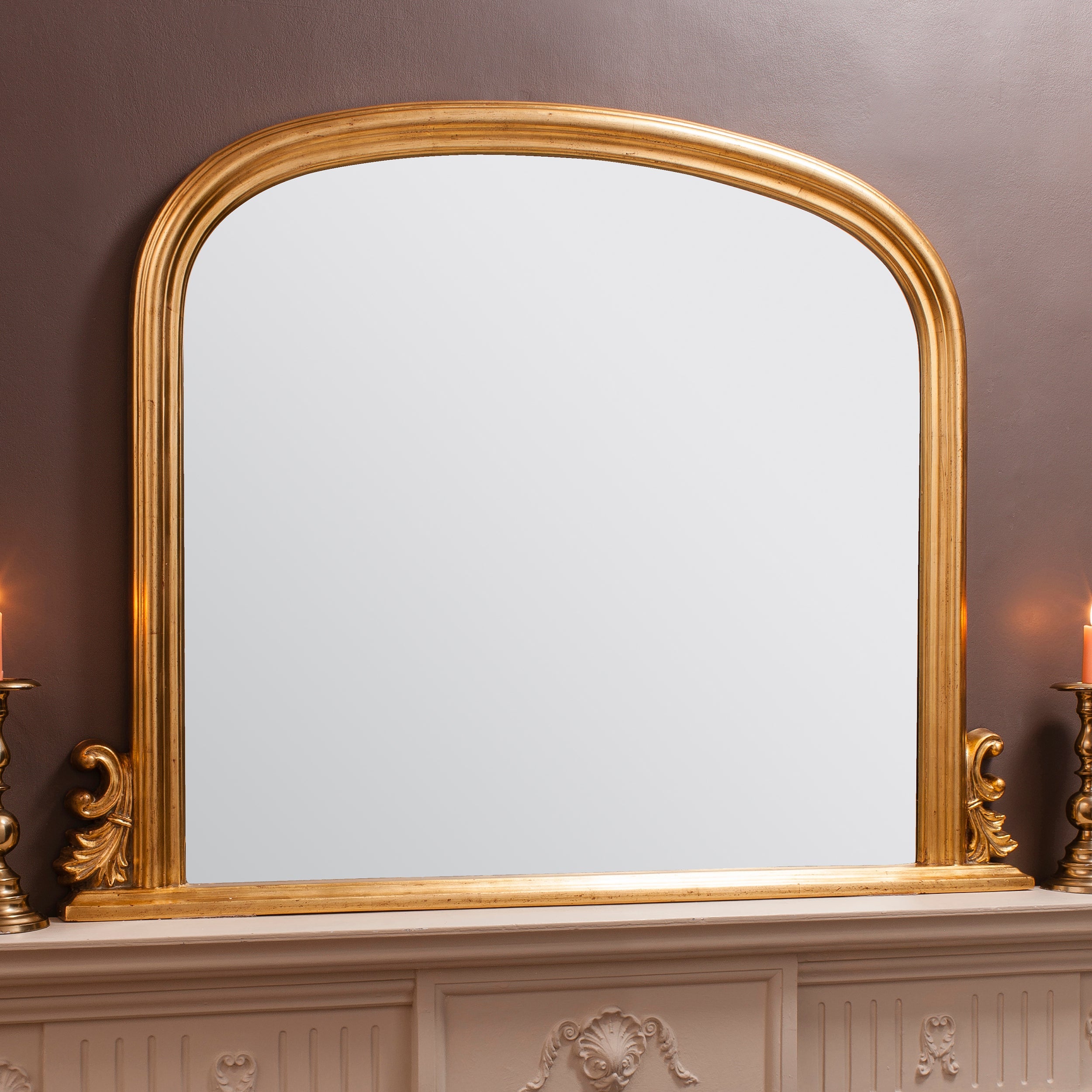Amos Gold leaf arch over mantel mirror